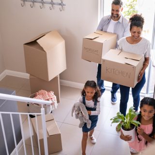 Black family moving into a new house