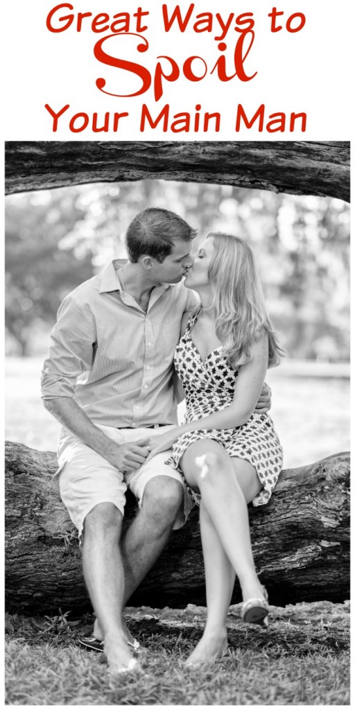 Man and woman kissing on log