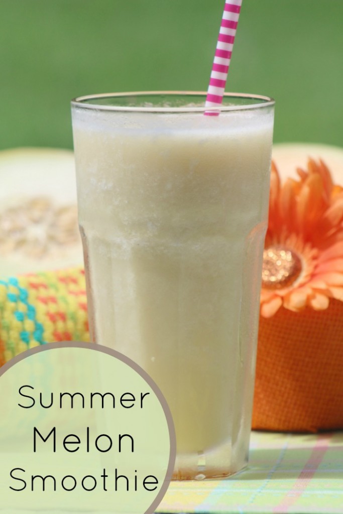 Melon smoothie in glass on table