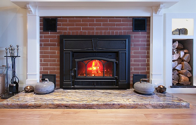 Natural stone used as a hearth in a fireplace update