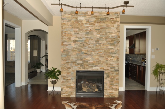 Stacked stone or slate are great choices to update your fireplace