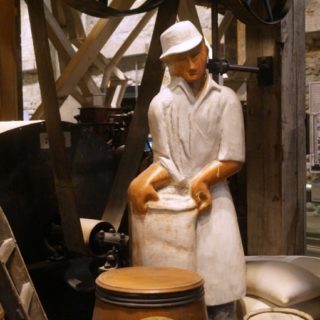 wood carving of mill worker at Mill City Museum in Minneapolis, MN