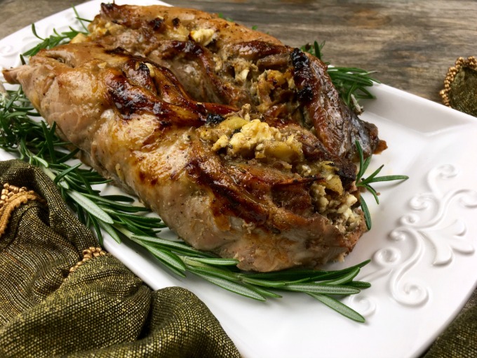 Roast pork tenderloin stuffed with dates, apples, and feta