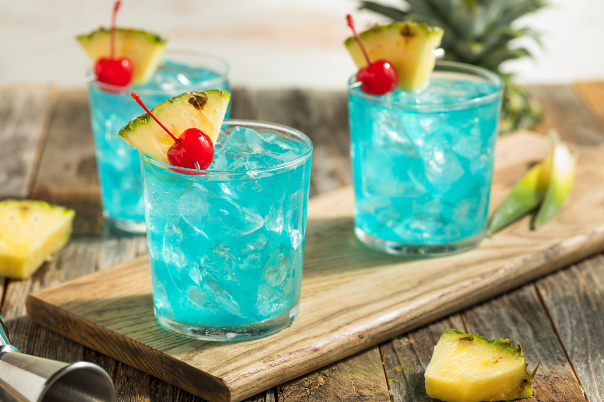 Refreshing Blue Hawaii Cocktail Punch with Pineapple and Cherry