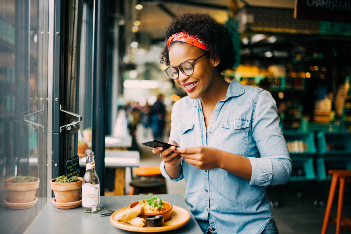 https://www.gretasday.com/wp-content/uploads/2023/05/Black-woman-taking-photo-of-food.jpg