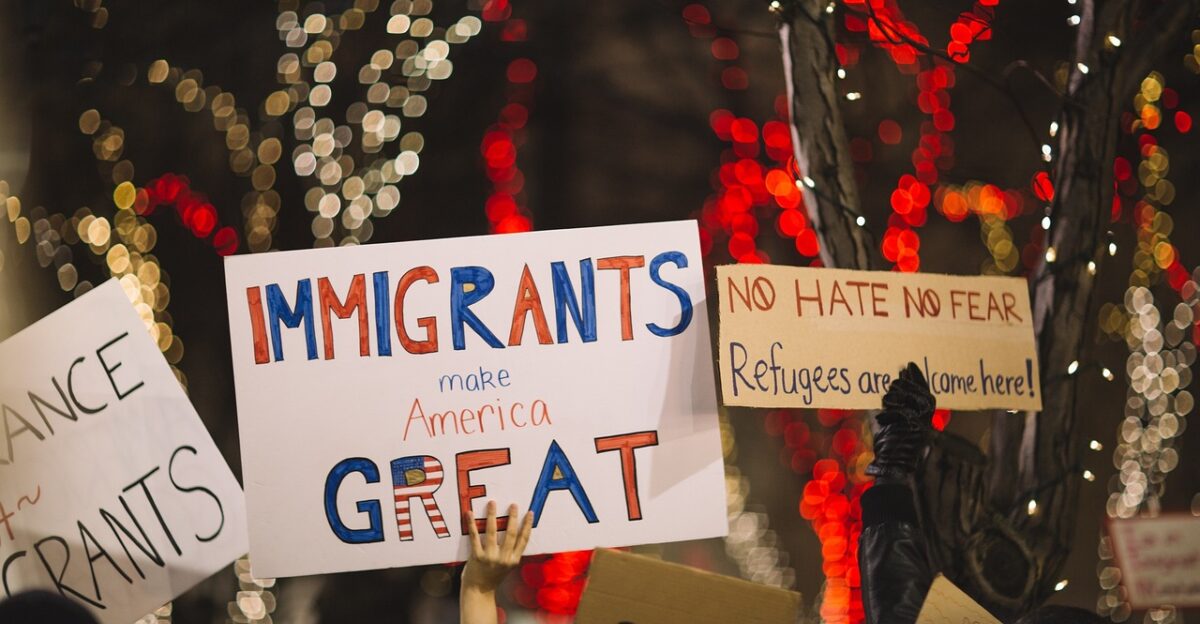posters people rally protest immigrants us america human ights night bokeh lights unite brown night brown human brown bokeh protest protest protest immigrants immigrants immigrants immigrants immigrants