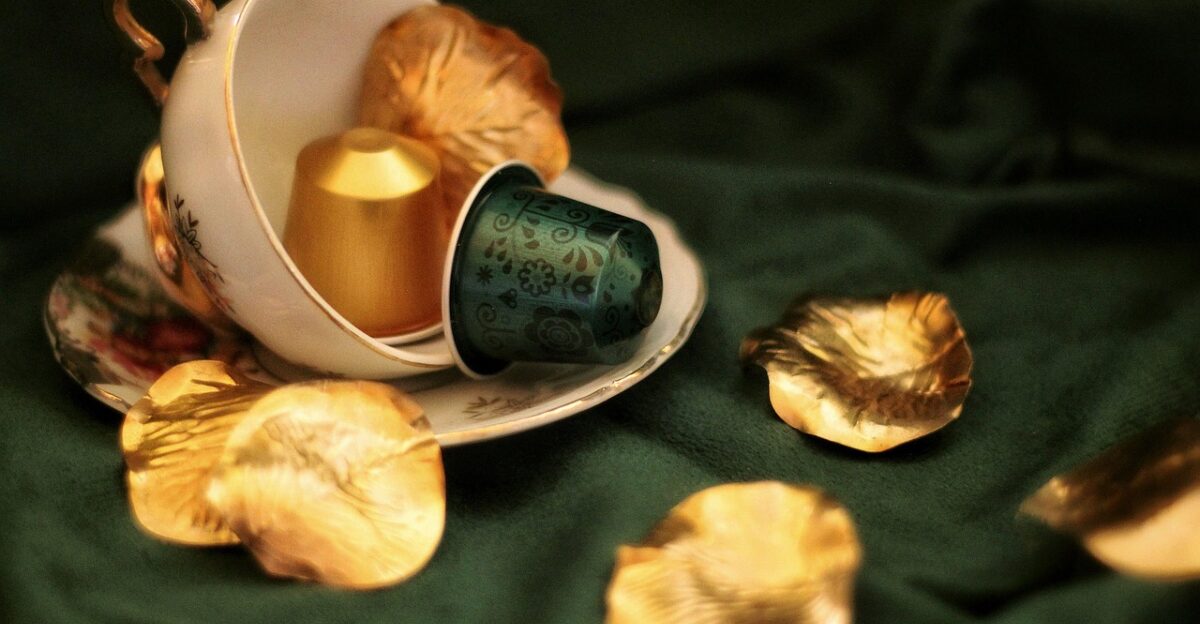 coffee capsule gold green elegant coffee cup cup petal still life coffee pod
