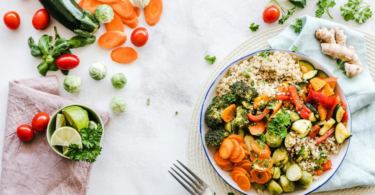 Colorful quinoa salad with fresh vegetables creates a healthy balanced meal