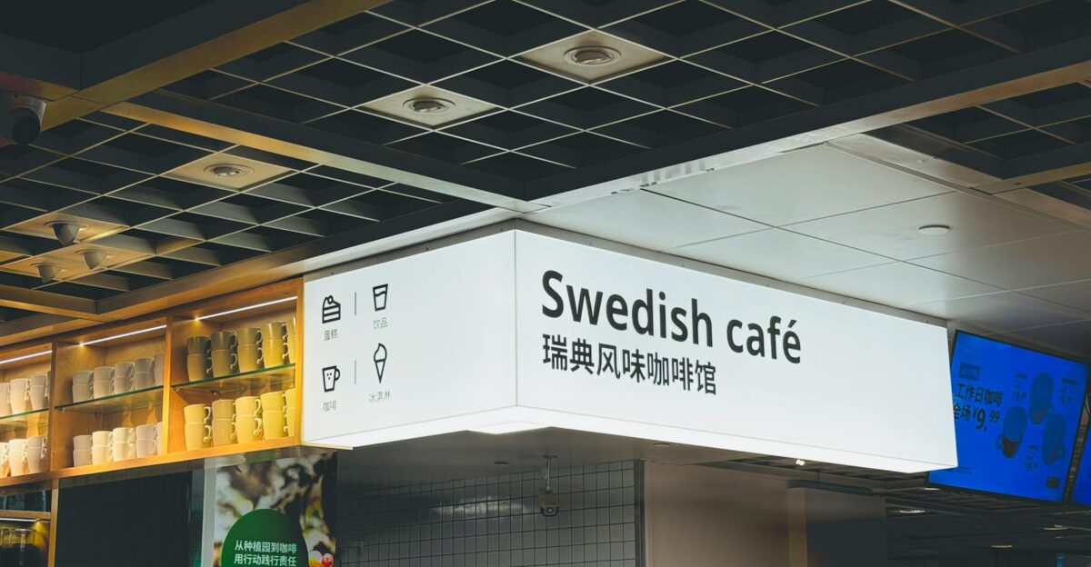 Interior of a Swedish caf in Tianjin China featuring illuminated sign and modern decor