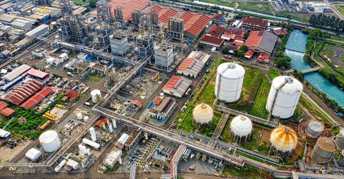 A detailed aerial view of an industrial facility in Banten Indonesia showcasing large tanks and architectural structures
