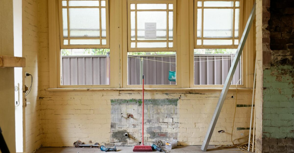 An empty room featuring large windows ready for renovation in Sydney Australia