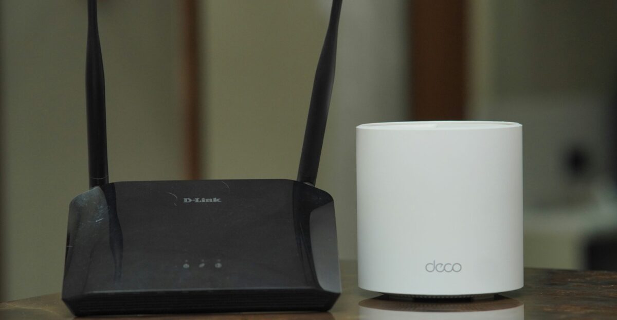 a couple of routers sitting on top of a table