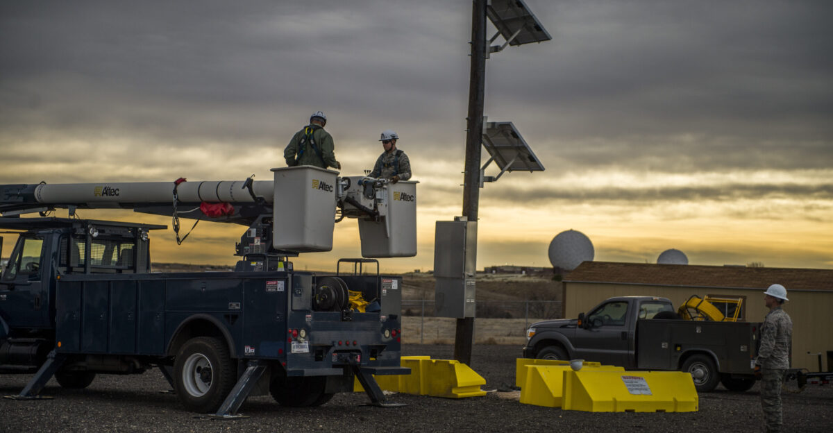 Chief Master Sgt Rodney Lindsey 460th Space Wing command chief and Staff Sgt Colton Dillard 460th Space Communications Squadron cable and antenna supervisor prepare to go up in a bucket truck to inspect a giant voice system Jan 19 2018 on Buckley Air Force Base Colorado Chief Lindsey went out to shadow part of the 460th SCS to learn more about what they do on a day to day basis U S Air Force photo by Senior Airman Stephen G Eigel
