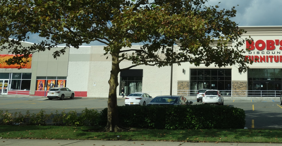 The Bob s Discount Furniture in the Triangle Centre shopping center at 20th Avenue and Petracca Place approximately 141st Street in College Point Queens This mall is located next to the College Point Center Landmark Plaza but is not a part of it