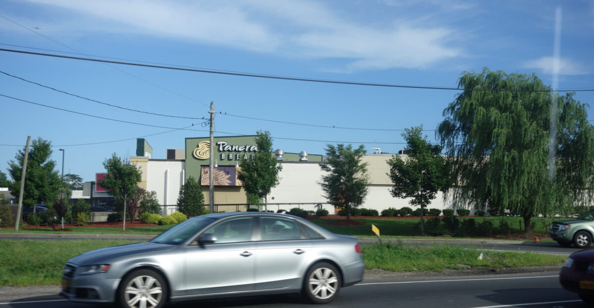 Looking east from a Far Rockaway-bound Q113 Limited bus at the Panera Bread in the shopping center at Nassau Expressway and Bay Boulevard Peninsula Boulevard in Inwood Nassau County New York