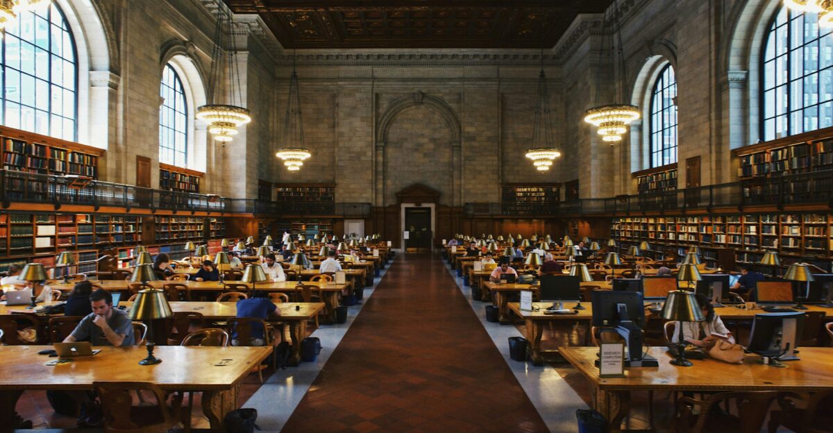 group of people inside the library