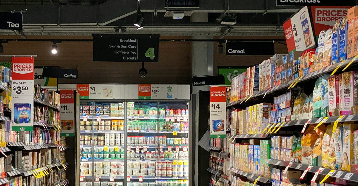 white and red labeled pack on white shelf