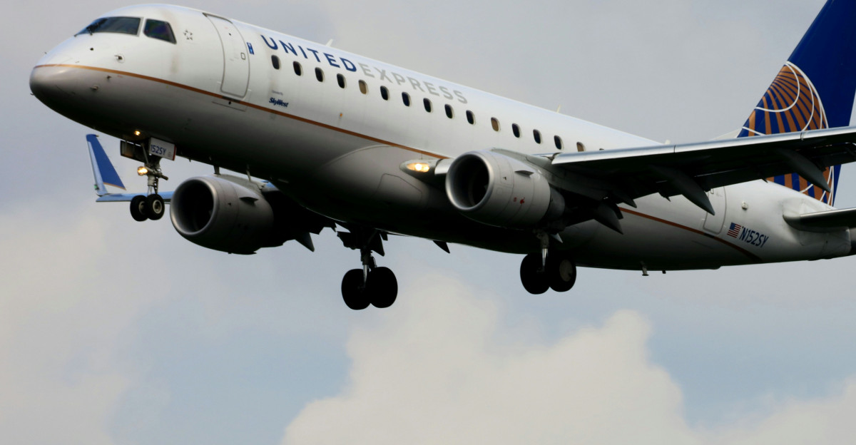 a large airplane flying in the sky