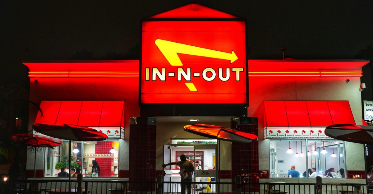 a restaurant with a sign