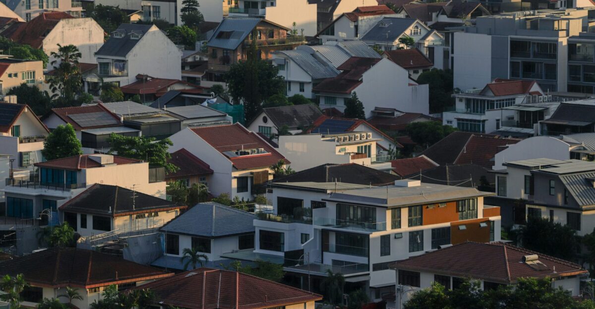 Here s a caption for the image a dense residential area filled with rooftops