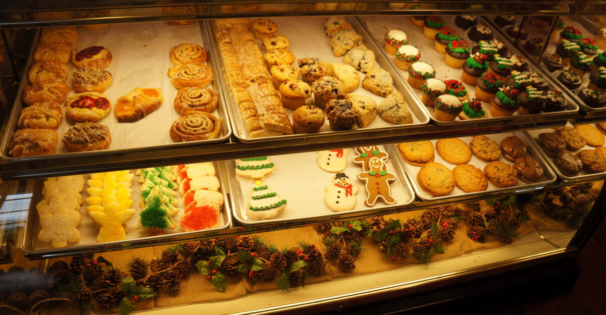 One of the display cases in The Bakery off Augusta includes items similar to many bakeries but they also sell items more commonly seen in Switzerland Nussgipfel Hazelnut croissant below Chrabeli Swiss Anise Crescent Cookies and other special Swiss items as well as custom cakes